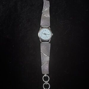 Modern Silver Jewelry Watch with Geometric Band and Light Blue Dial